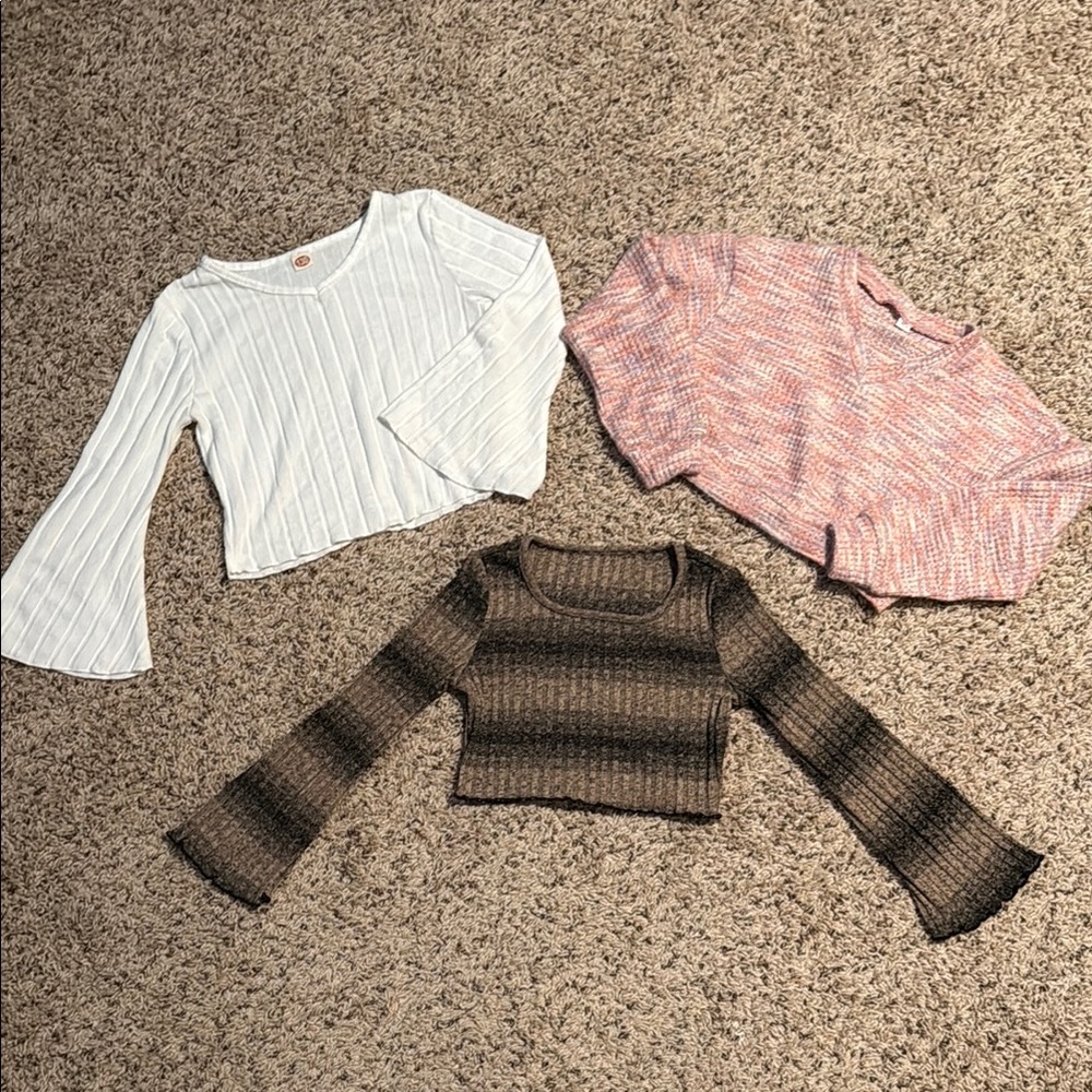 Bundle of girls (mainly size 7) long sleeve crop tops and one pair of shorts